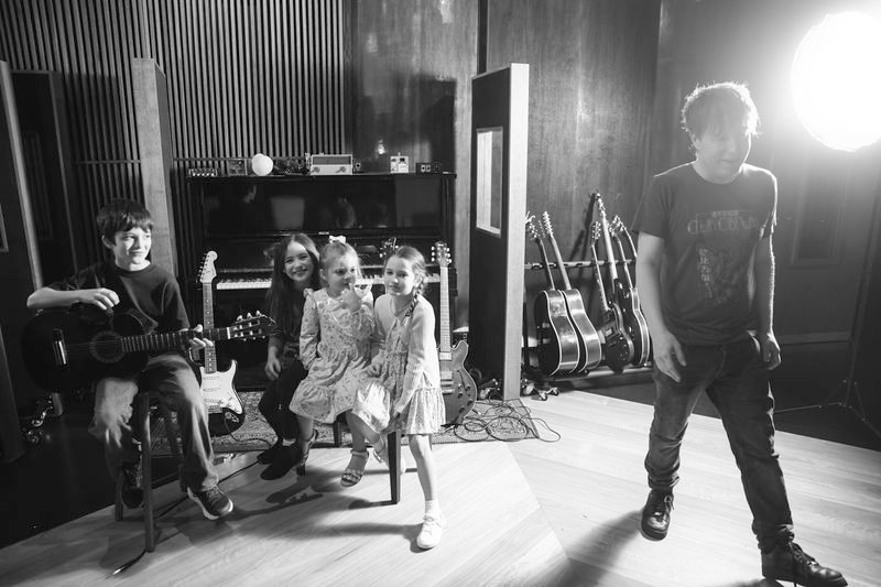Dave with young students in the live room