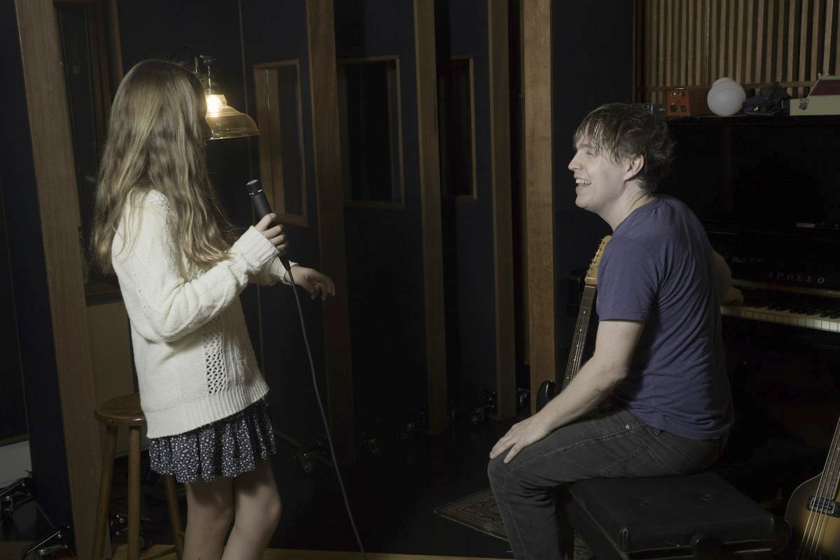 A one-on-one guitar lesson at Stairway Music Academy